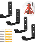 Four black metal jack-stand wall hooks with mounting plates and screws; fits 2–6 ton stands; wall-mounted example.