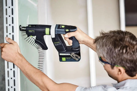 Jobsite Essential 18 Volt Cordless Drill Driver in use for drywall installation with collated fasteners.