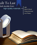 Grab And Go Rechargeable LED Lantern With 2000mAh Battery beside an open book on a wooden table