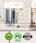 Dual Countertop Water Filter With Carbon And Mineral PH Alkaline System on kitchen counter next to a sink
