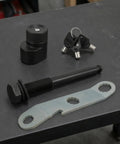 Heavy Duty Trailer Lock Bolt And Hitch Pin Replacement For Bike Racks Anti Theft Security Fastener With Keys And Wrench Plate set on table.