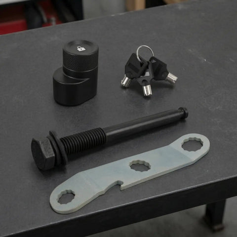 Heavy Duty Trailer Lock Bolt And Hitch Pin Replacement For Bike Racks Anti Theft Security Fastener With Keys And Wrench Plate set on table.