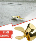 Beefy Four Blade Zinc Alloy RC Boat Propeller With Gold Plated Finish 4Mm Shaft 55Mm Or 60Mm Diameter shown with a speeding boat