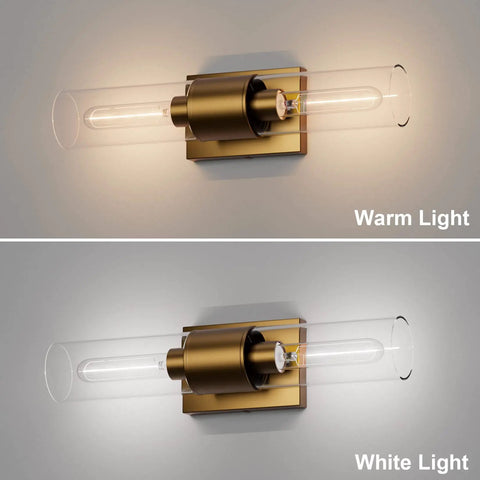 Stylish Modern 2 Light Vanity Light Fixture In Matte Gold With Clear Glass Up And Down Wall Sconces showing warm and white light.