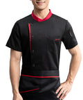 Heavy Duty Unisex Chef Jacket And Lightweight Kitchen Workwear Breathable Button Down Coat With Ergonomic Slim Fit Designed For The Daily Grind Black chef jacket with red accents and pocket, model showing front view.