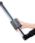 Hand holding Compact Linear Guide Belt Drive Module For CNC With Nema 17 Stepper Motor 100mm Stroke, lightweight aluminum