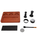 Solid Wood Espresso Tamper Station With Silicone Mat And Seven Piece Barista Gear including tampers, dosing ring, brush, and mat.