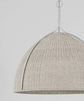 Top Shelf One Light Handwoven Dome Pendant Lamp With Vintage Gold Leaf Finish Heavy Duty Steel Customizable Hang Height Damp Rated Bathroom Ceiling Fixture Slick Organic Vibe For Any Space, close-up view of beige rattan dome.