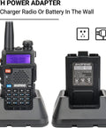 Dual Band Long Range Handheld Ham Radio Kit with 1800mAh Rechargeable Battery on charging dock with display