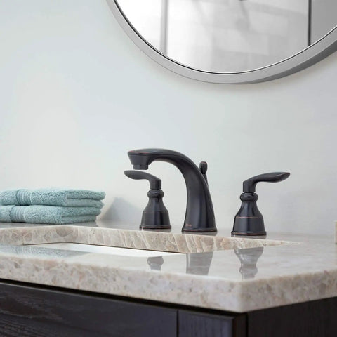 Avalon Two Handle 8 Inch Widespread Bathroom Faucet in Polished Chrome with modern sink and marble countertop