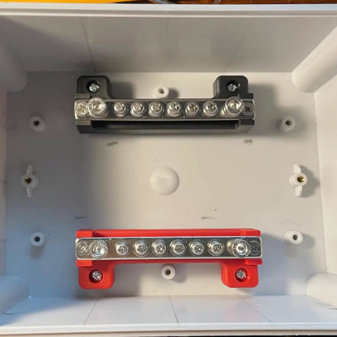 2 Pack Power Distribution Block 4 Inch Bus Bar 150 Amp 12 Volt System in a box, featuring black and red nickel plated brass bars.