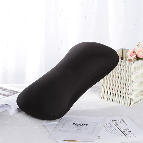 Black Comfy Microbead Roll Pillow 15 by 8 Inch Squishy Cushion for Neck and Back Support on a white table.