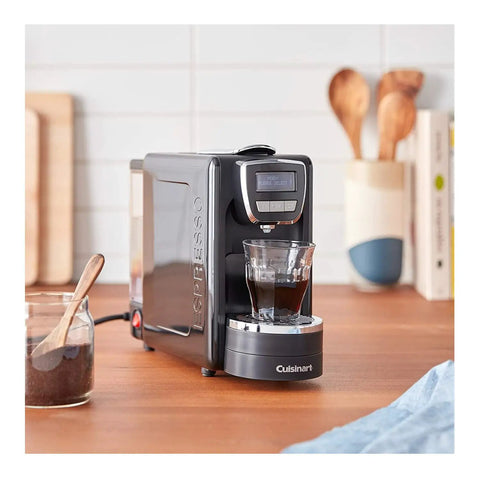 Kickstart Your Daily Grind With This Total Game Changer Black Espresso Machine on kitchen counter with espresso shot.