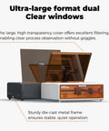 Creality Falcon A1 laser engraver and cutter with orange translucent lid and white chassis