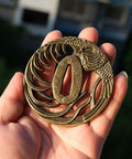 Hand holding Hand Forged Alloy Katana Tsuba Guard With Aquatic Pattern 3.2 Inch Authentic Iaido Accessory for Samurai Swords