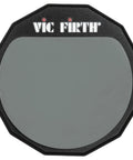 Six Inch Single Sided Practice Pad With Realistic Drumhead Feel And Low Volume For Quiet Jamming On The Go Natural Rubber On A Durable Wood Base To Train Wrists And Keep Your Chops Tight. single-sided drum practice pad with gray rubber surface and wood base