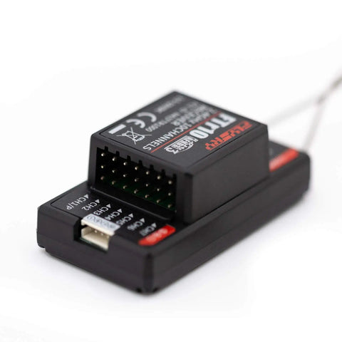 Close-up of FTR10 2.4GHz AFHDS 3 Receiver With Dual Antennas, showing connectors for PL18 Transmitter RC Drone Airplane Helicopter