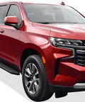 Red Chevy Suburban with Beefed Up Stainless Steel 6 Inch Wide Running Boards For Chevy Suburban 2021 To 2026 Side Steps With Anti Slip Tread Factory Fit DIY Install Kit With Mounting Brackets And Hardware Included visible