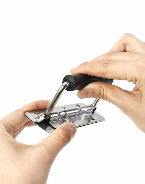 Hands holding stainless steel spring loaded case handle with rubber grip 304 grade for cabinets, wardrobes, drawers, garage storage