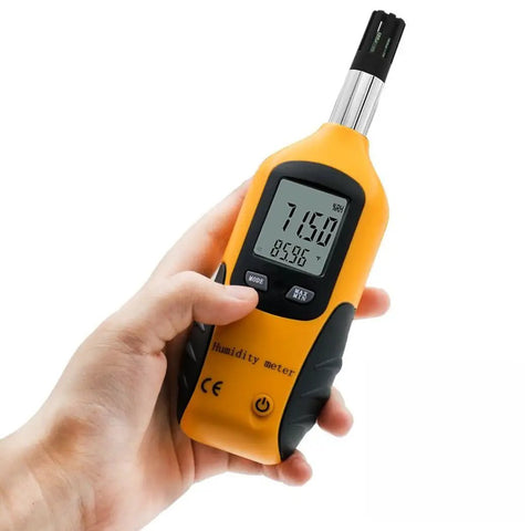 Hand holding Handy All In One Digital Hygrometer And Psychrometer With Dew Point And Wet Bulb Readouts, compact LCD screen