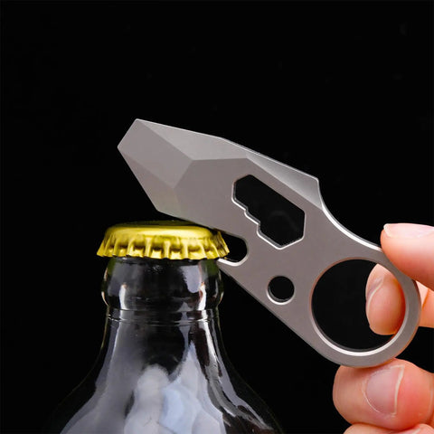 Dope Everyday Carry Multi Tool Keychain With Pry Bar Bottle Opener And Wrench For Men shown opening a bottle cap