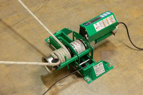 Super Heavy Duty Greenlee Gx10 10K Tugger With Floor Mount for faster pulls, featuring a robust electric motor and cable.