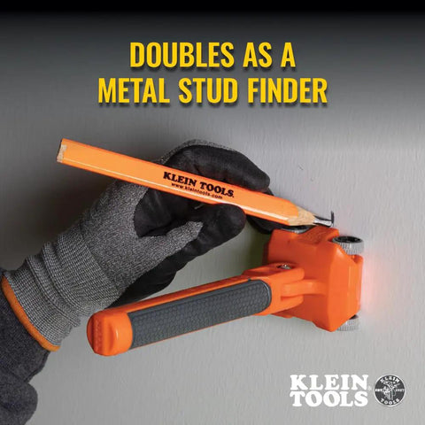 Gloved hand using Pro Grade Magnetic Wire Puller for behind walls; doubles as a metal stud finder.