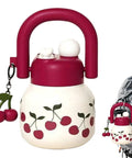 800ml Large Capacity Water Bottle With Handle For Sports And Hiking, cherry design, attached to a backpack