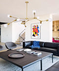 Gold 9 Light Sputnik Chandelier Modern Metal Ceiling Hanging Light Adjustable Pendant Fixture For Living Room Bedroom Kitchen Island Foyer Vintage Style Statement Lighting installed in modern living room.