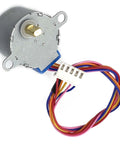 Front view of a 28BYJ-48 5V DC stepper motor with multicolor 6-wire lead and white connector