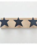 Keep Your Hallway Looking Fly With These Durable Wall Mounted Coat Racks Perfect For Kids Rooms To Hang Jackets Caps Bags And Towels Bolt Down Setup Super Tough Frame Everyday Go To Piece. Black star hooks on a wooden rack.