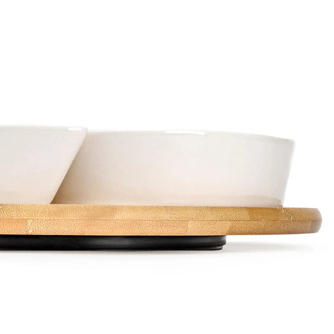 Side view of Ceramic Rotating Serving Tray With Six Removable Compartments Lazy Susan Style 11 Inch Divider Set on bamboo base.