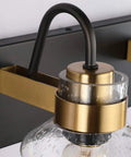 Close-up of black and brushed gold farmhouse style over mirror wall sconces with bubble glass from Two Light Bathroom Vanity Lighting Fixture.