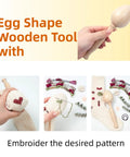 Egg-shaped wooden darning tool with embroidery example, threads, needles, and knitted sock for quick repair and pattern creation.