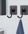 12 Pack Heavy Duty Adhesive Wall Hooks Aluminum Towel Hangers For Hanging Coats Hats Towels Robes Keys And Clothes Stick On Wall Mounts For Kitchen And Bathroom Black, two hooks displayed