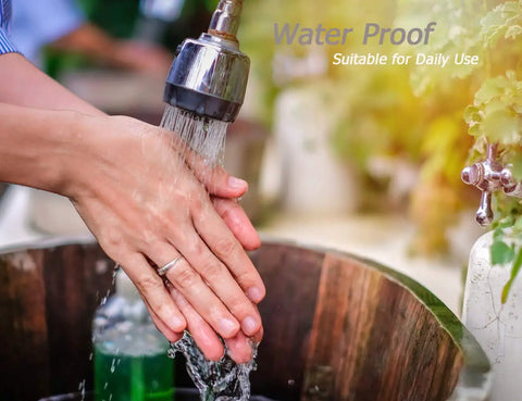 Hands washing under running water wearing a ring with Clear Silicone Ring Size Adjuster Guard For Loose Rings Fits Most Rings For Women And Men Four Adjustable Loop Sizes No Adhesive Needed Easy Resizing With More Loops For A Tighter Fit.