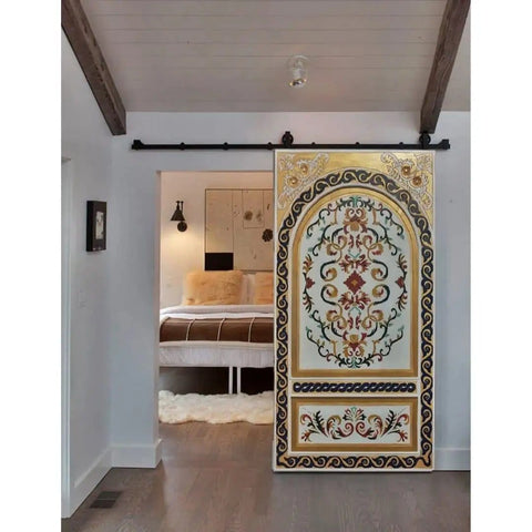 Hand-Carved Arched Barn Door With Rustic Farmhouse Style Custom Made Wooden Interior Door Sliding Barn Door For Home Or Office No Glass Or Hardware Included Size 71x34 Inches Ideal For Room Dividers And Entryways showing ornate pattern in a room.