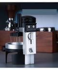Badass Espresso Stirrer And Coffee Distribution Tool For Leveling Portafilter Pucks Smooth Rotate Design breaks clumps, silver tool.