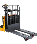 Heavy Duty Electric Pallet Jack Rider Packs Killer Six Thousand Six Hundred Pound Grip And Rock Solid Stand On Base With A Zippy Two Point Two Kilowatt Motor Plus Long Lasting Twenty Four Volt Battery For Zero Stress Warehouse Hauling And Smooth Floor, detailed side view showing forks and control panel.