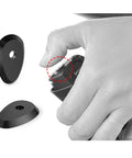 Close-up of hand using 4-Pack Pushbutton Spacers For Electronic Road Bike Shifting That Boost Your Shift Feel And Control