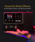 Hands holding GP 100 Guitar And Bass Amp Modeling Rig With IR Cabinets, 140 Built In Effects, 45 Amp Models, on display