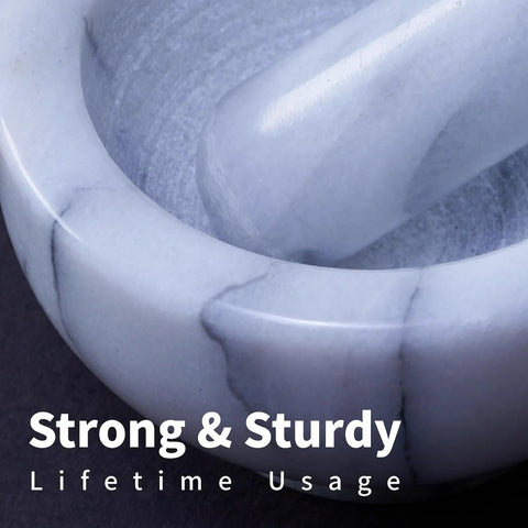 Close-up of unpolished Marble Mortar And Pestle Set 150ml Spice Grinder For Grinding Herbs And Spices Kitchen Utensil.