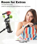 Tablet And Phone Tripod Mount Adapter With 1/4 Inch Thread And 17mm Ball Head installed with mic, woman using device