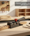 Rock Solid Woodworking Drill Guide Jig For Dead On Accurate Dowel Holes And No Sweat Furniture Assembly With Ten Polycarbonate Alignment Slots on a workbench.
