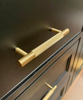 Solid Brass Cabinet Pulls 4 Pack 3 3/4 Inch Brushed Gold Modern Drawer Handle on kitchen cabinet with knurled texture