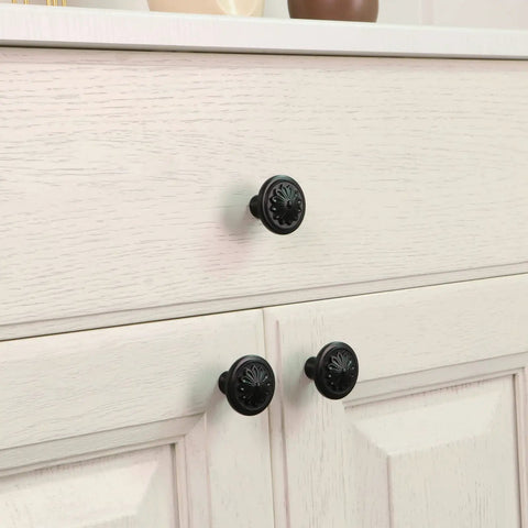 Matte Black Dope Round Cabinet Knobs Set of Fifteen for Cabinets and Drawers, 36mm Diameter Flower Shape in use on white drawers