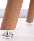 Fix Those Pesky Wobbles Fast With Adjustable M6 Furniture Levelers Screw On Glides under wooden chair leg with metal base.