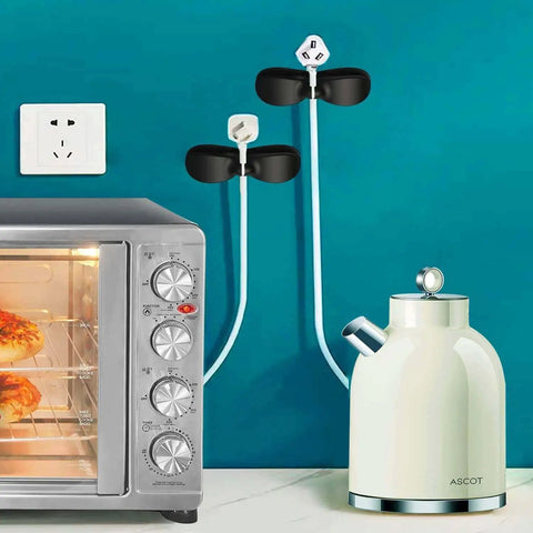 Three Pack Cord Organizer For Kitchen Appliances Stick On Cable Wrapper Holder installed on wall with toaster and kettle