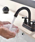 Person washing hands with water from Oil Rubbed Bronze Bathroom Faucet With 2 Handles 4 Inch Centerset Vanity Sink Faucet Stainless Steel Farmhouse Deck Mount Lavatory Mixer Tap For RV And Home