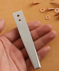 Copper Rivet Setter Tool 2 In 1 For Leatherworking Stainless Steel Burr Setter in hand with copper rivets on surface